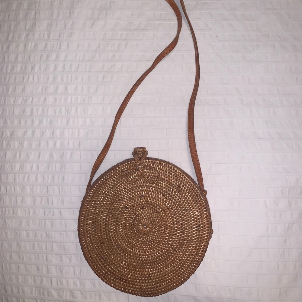 Brown wicker circular crossbody bag